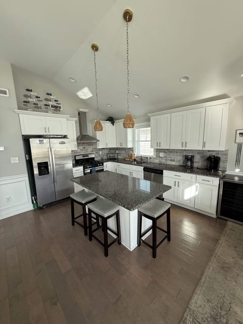 2nd Floor Kitchen has modern stainless steel appliances and large island