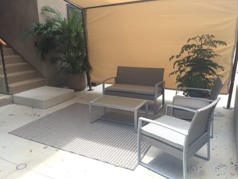 Your private patio. Morning and early afternoon sun, or shade under the canopy.