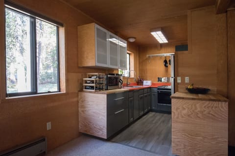 The kitchen is small but quite functional and reasonably well-equipped