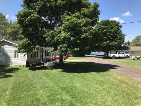 view down the lane to the waterfront and beach