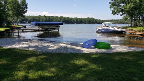 Protected cove and sandy beach access to shallow area