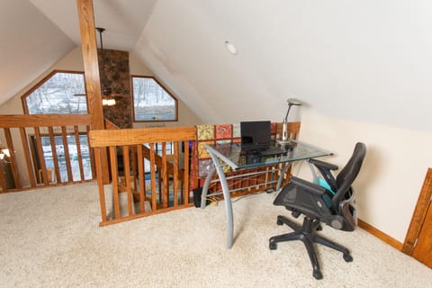 Up stairs work station with a view of the river. Great for telecommuters.