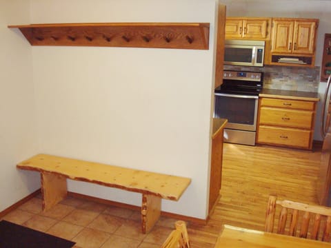 There's also a handy coat rack for jackets, bags and a place to store shoes.