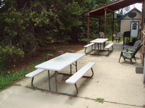 The backyard patio lets you lounge in sun or shade, relax together & share meals