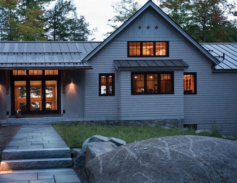 Front walkway and front door left. Kitchen / great room right.
