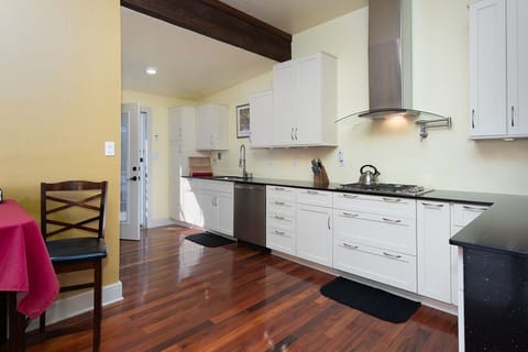 The kitchen has all the appliances, dishes, and cookware that you'll need.