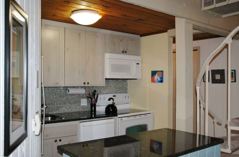 Delightful kitchen with all you need to prepare meals, have your morning coffee.