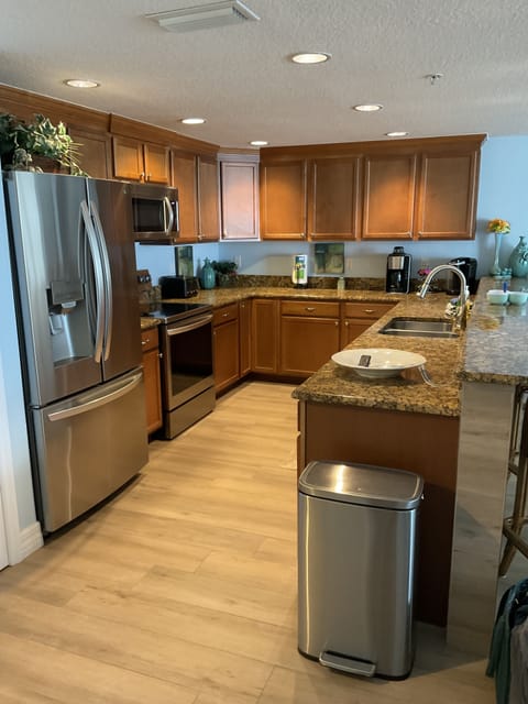 Kitchen with new stainless appliances
Refrigerator has 2 ice makers