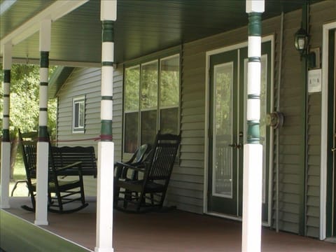 Relax on the Front Porch.  Enjoy the built in swing, the rocking chairs.