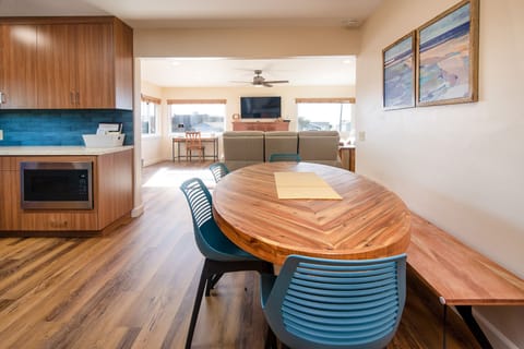 The dining room has an open floor to the living room.