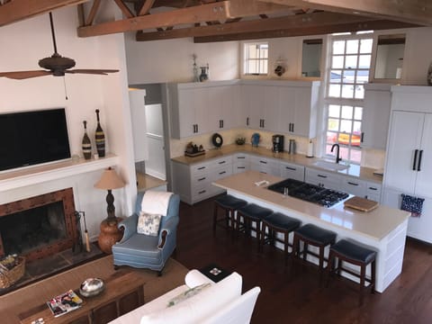 Open living area and newly remodeled gourmet kitchen with all new appliances 