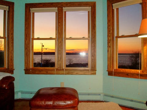 Master bedroom sitting area at sunset.