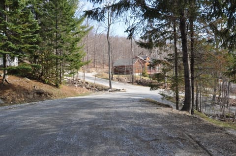 view of trail from the street in front of condo