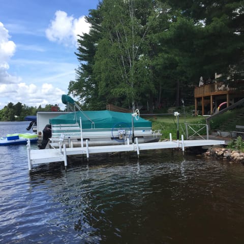 Private dock and boat lift on Eagle River Chain
