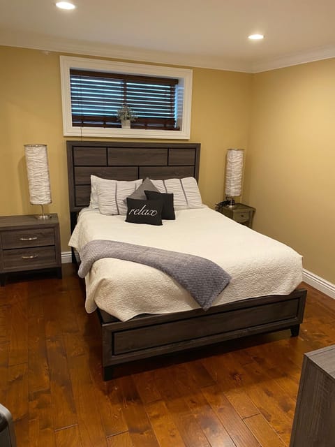 Bedroom with queen bed and large closet