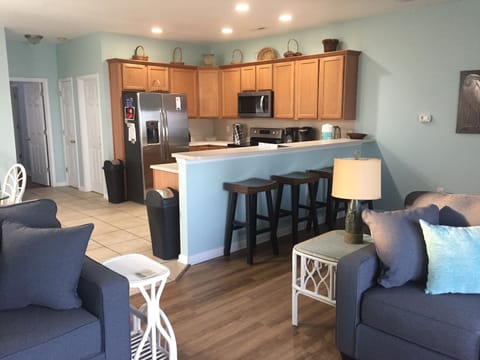 Open concept kitchen/living room to optimize family time.
