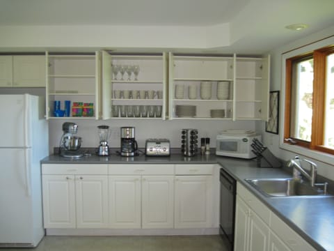 Upgraded appliances including a Kitchen Aid.