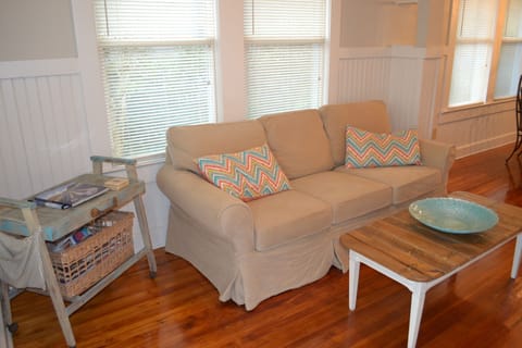 Slipcovered sofa affords the ability to launder entire surface regularly.