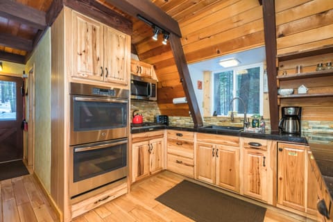 Kitchen with Double oven and gas stove 