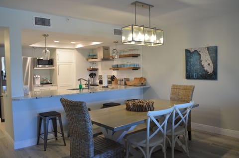 Our dining room seats 6 comfortably, plus 4 barstools at the counter