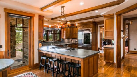 Chefs kitchen w/ subzero fridge, wolf range, warming drawer & wine fridge