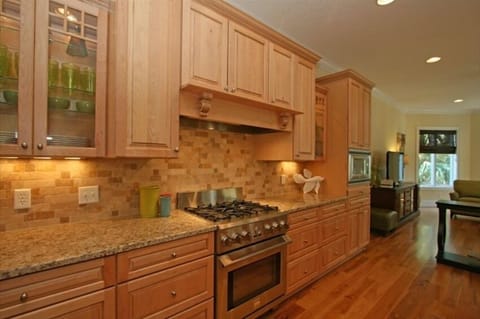 Kitchen with Gas Stove, Granite Countertops, and Stainless Steel Appliances