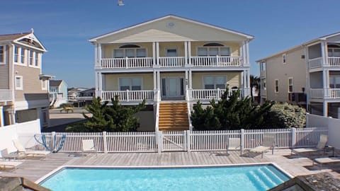 Oceanfront with pool by pier