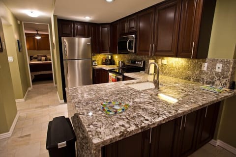 Updated kitchen, granite counters, new cabinets and stainless steel appliances.