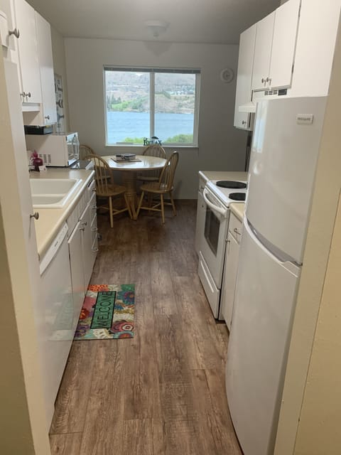 The kitchen is filled with all the amenities needed for a fun vacation!