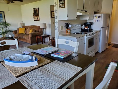 A view from inside the condo livingroom, kitchen, dining room.