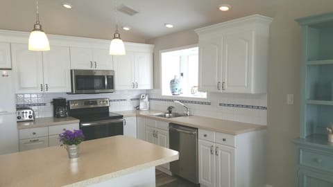 Kitchen showing new appliances and new lighting - May 2019