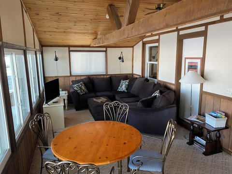 Comfortable, relaxing porch overlooking the Lake.  Play games at the table.