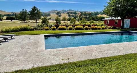 The  hill views from the expansive 20'x40' pool deck takes all your stress away