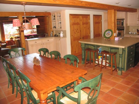 Large kitchen and dining area. Two dishwashers, prep sink, trash compactor