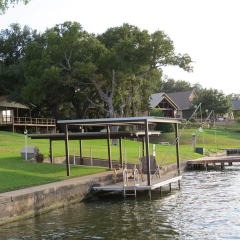 Shaded dock and covered boat lift good for boats up to 5,000 pounds.