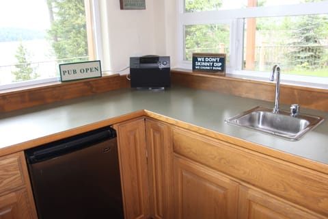 Bar area has mini fridge, sink, and tons of games, cards, & puzzles.