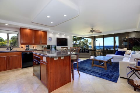 Kitchen and Living Room | View of the ocean can be seen from the lanai