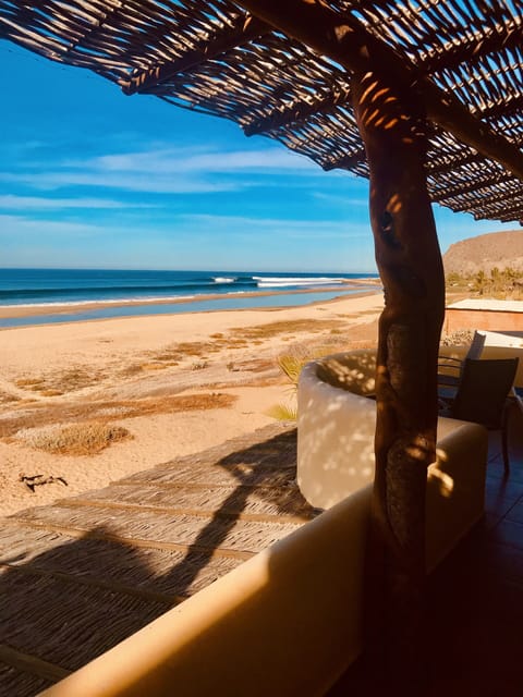 San Pedrito surf point seen from the upstairs beachfront suite terraza