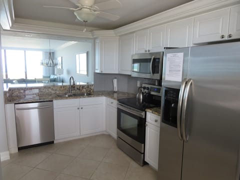 Never miss the view or conversation while in New Kitchen. W. SS Appliances!