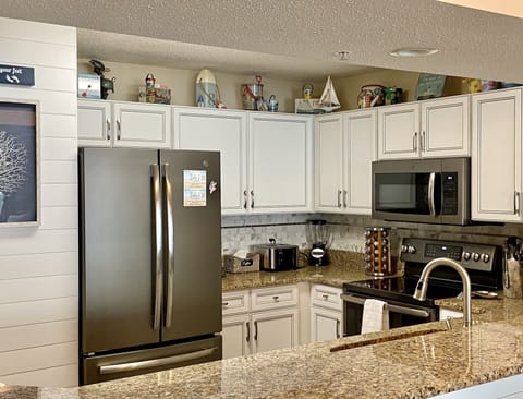 Coffee maker, toaster, blender, crock pot, mixer, electric fry pan. 