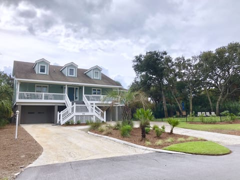 Welcome to Frippin' Good Times!
Front of house and inground pool in side yard.