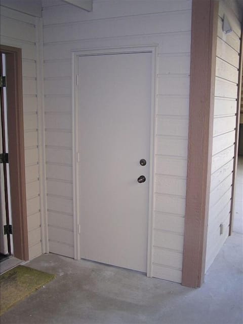 Outside storage closet with lock for storage of skis