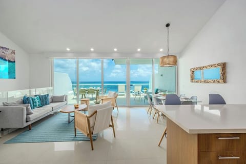 Step into your bright, modern sanctuary with sparkling ocean views framing your living and dining space. Coastal-inspired decor and an open layout invite you to relax and soak in breathtaking sea vistas from every corner.