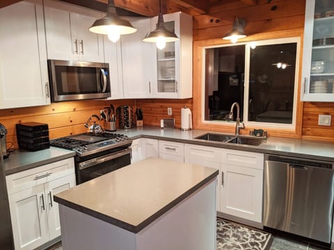 Kitchen stove, microwave and refrigerator. Keurig coffee maker, toaster, etc.