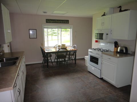 Fully equipped kitchen. Pots, pans, utensils, coffee maker, toaster, etc. 