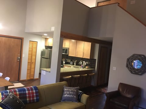Living room looking back into the updated kitchen.