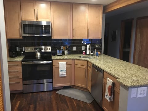 Rare unit with the stove moved off the bar.  Yay for counter space!