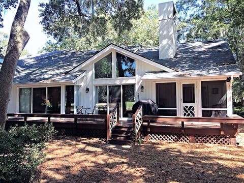 Large deck and screen porch facing golf course.