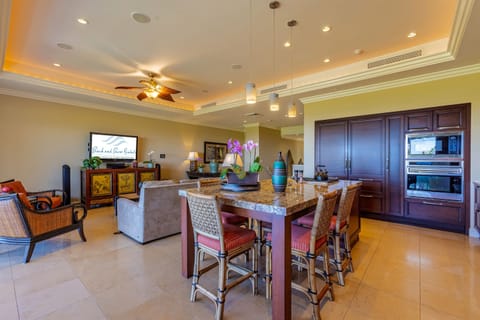 Dining area with elegant lighting, perfect for meals shared with family or friends