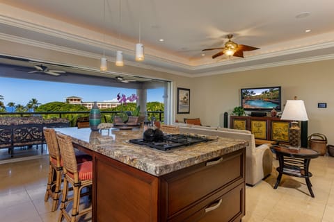 Gourmet Kitchen with Ocean View - Prepare delicious meals in the well-equipped kitchen while enjoying the beautiful ocean view.
